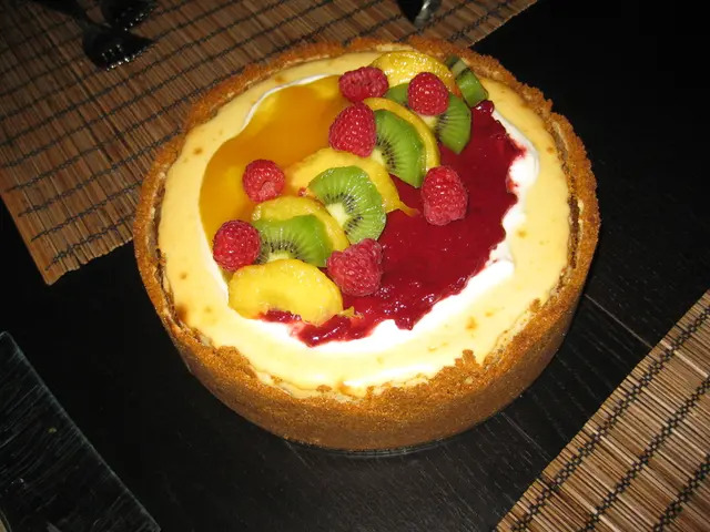 In this picture we can see cake, strawberries, fruits, forks and mats on the platform.